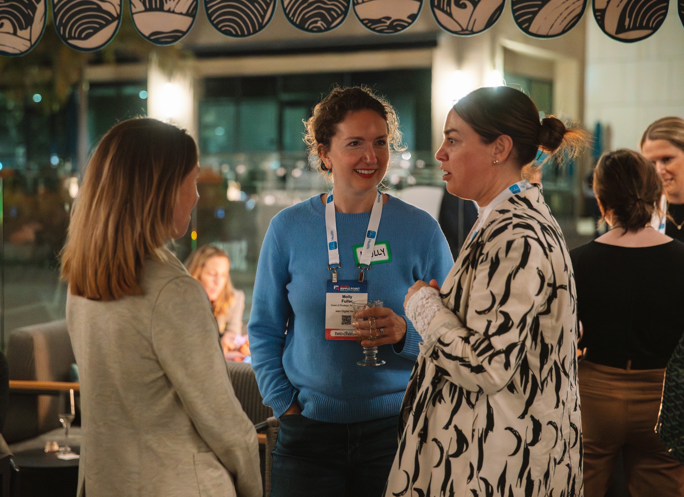 WELL community members connecting at an event