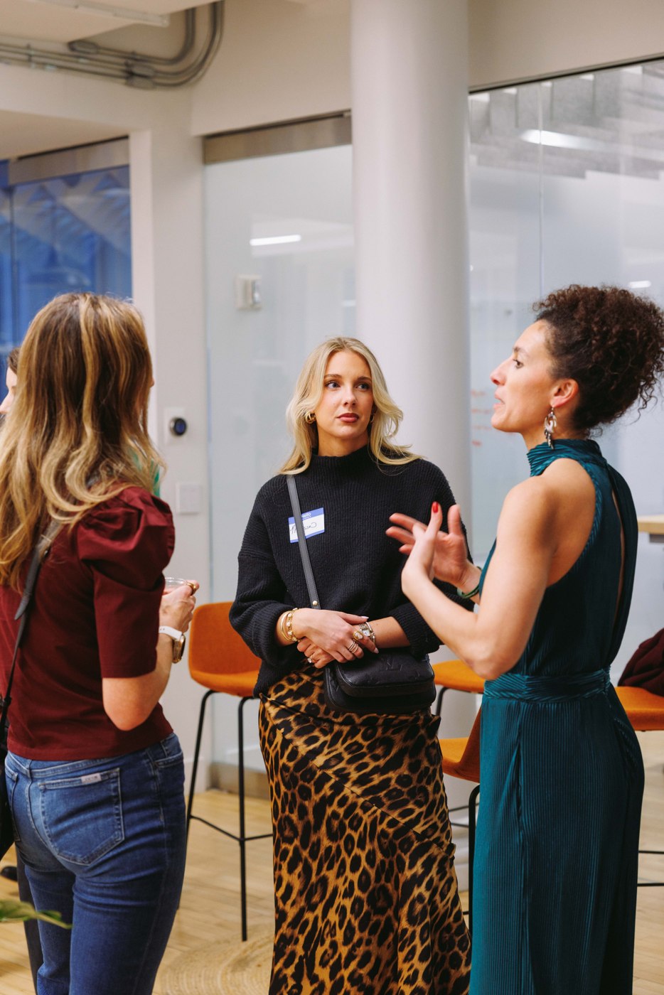 Women connecting in a small group at the WELL Summit