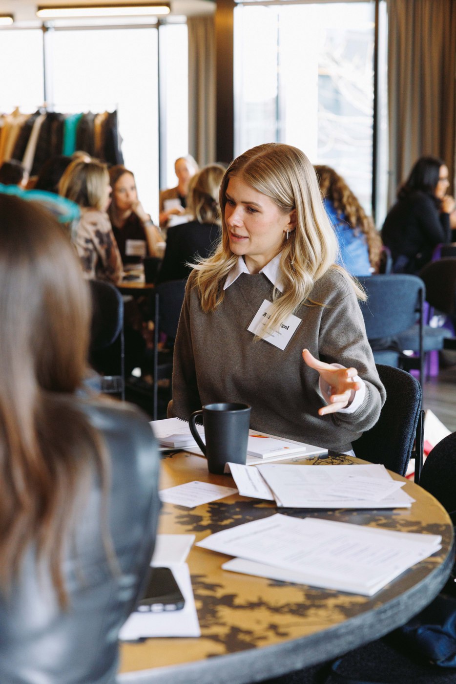 Women collaborating during a Summit discussion